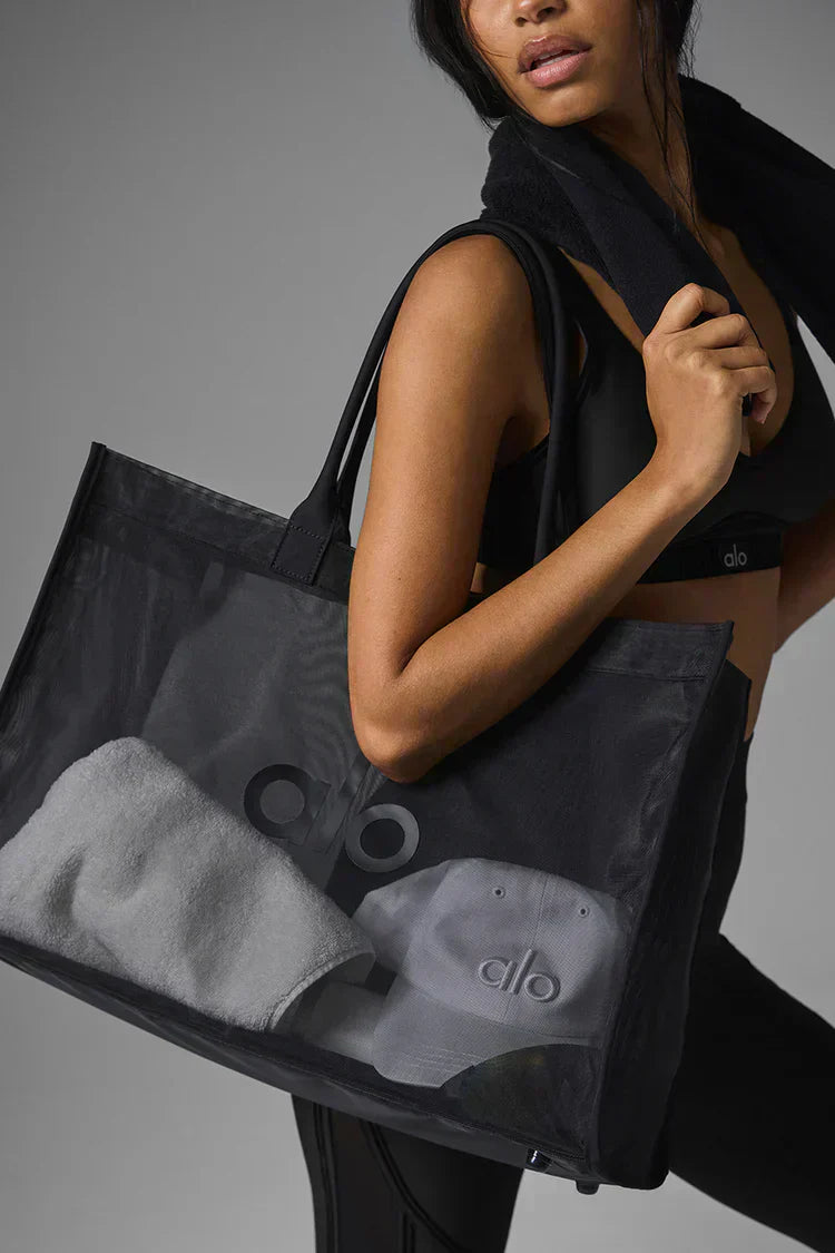 Bolsa de mano transparente negra
