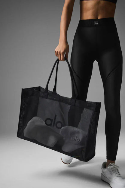 Bolsa de mano transparente negra